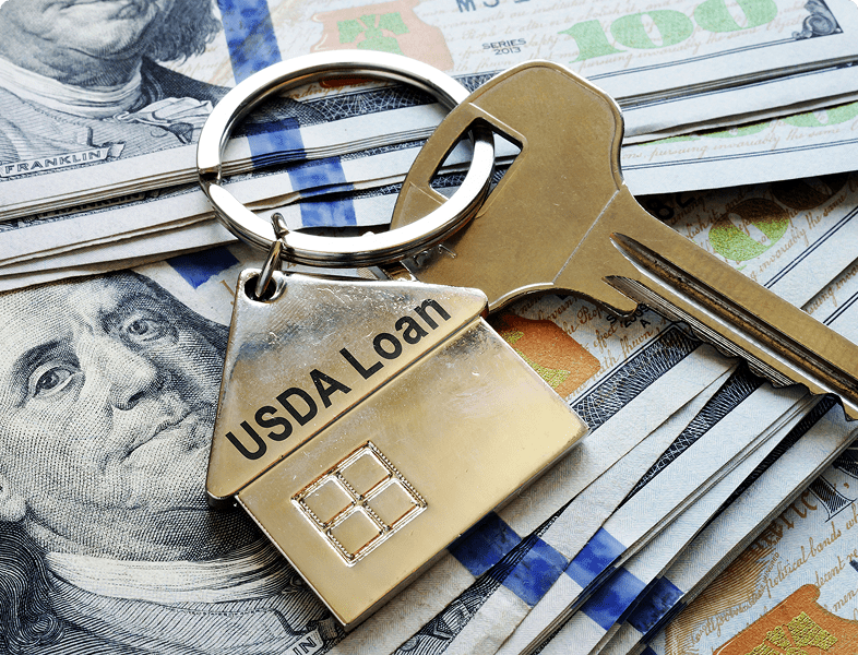 Keys and USDA loan tag on cash