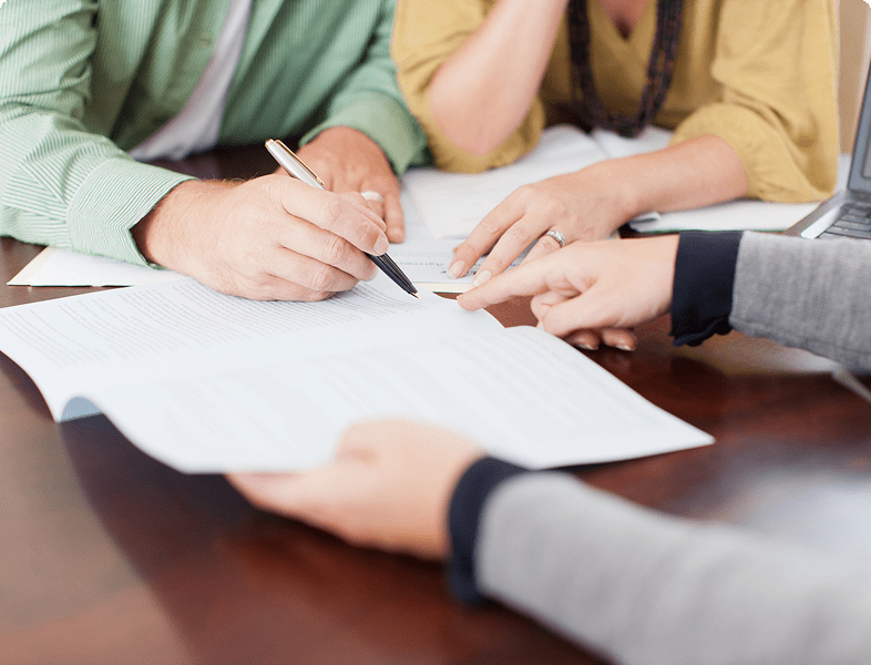 Reviewing documents together at a table