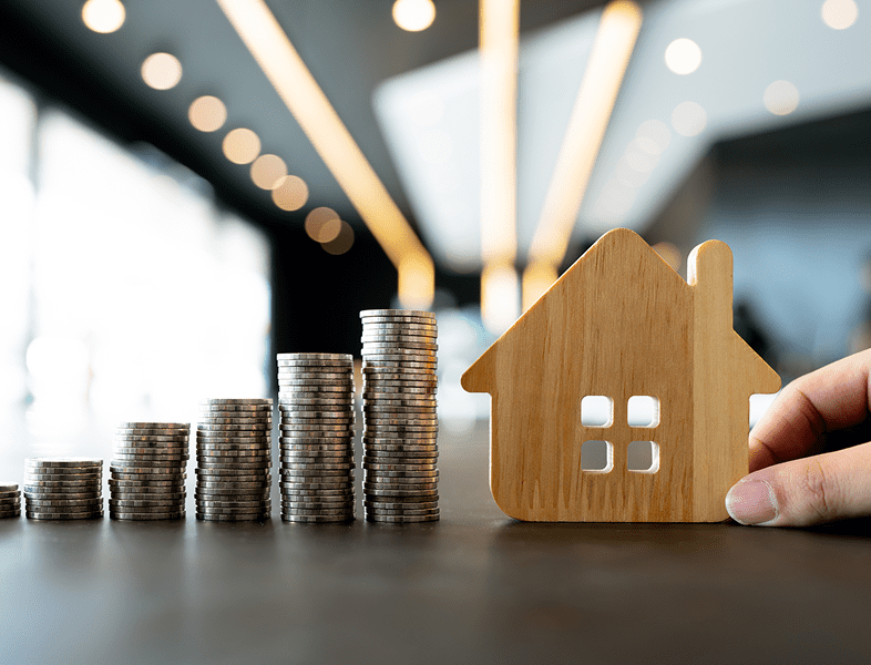 Real estate investment concept with coins